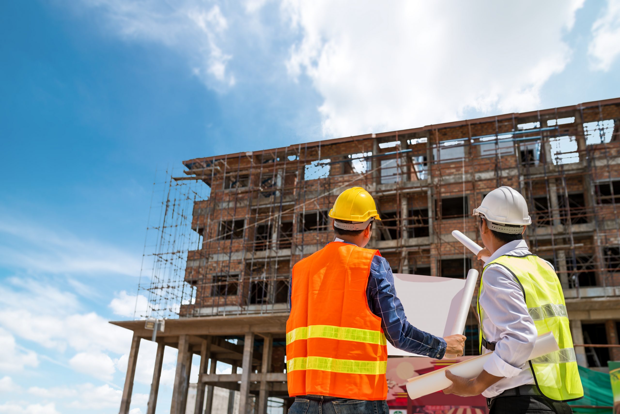 Engineering Concept,Businessman engineer looking blueprint in a